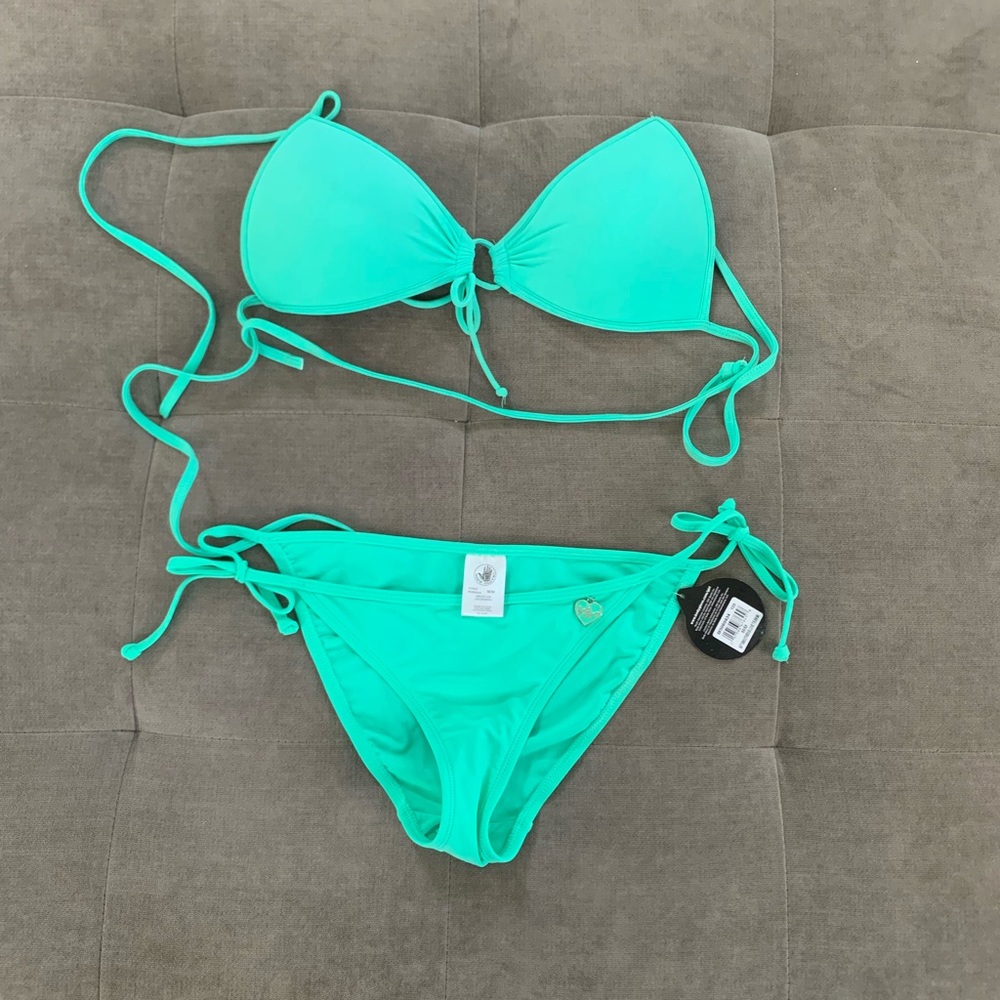 Teal body glove  bikini. Never worn tags on